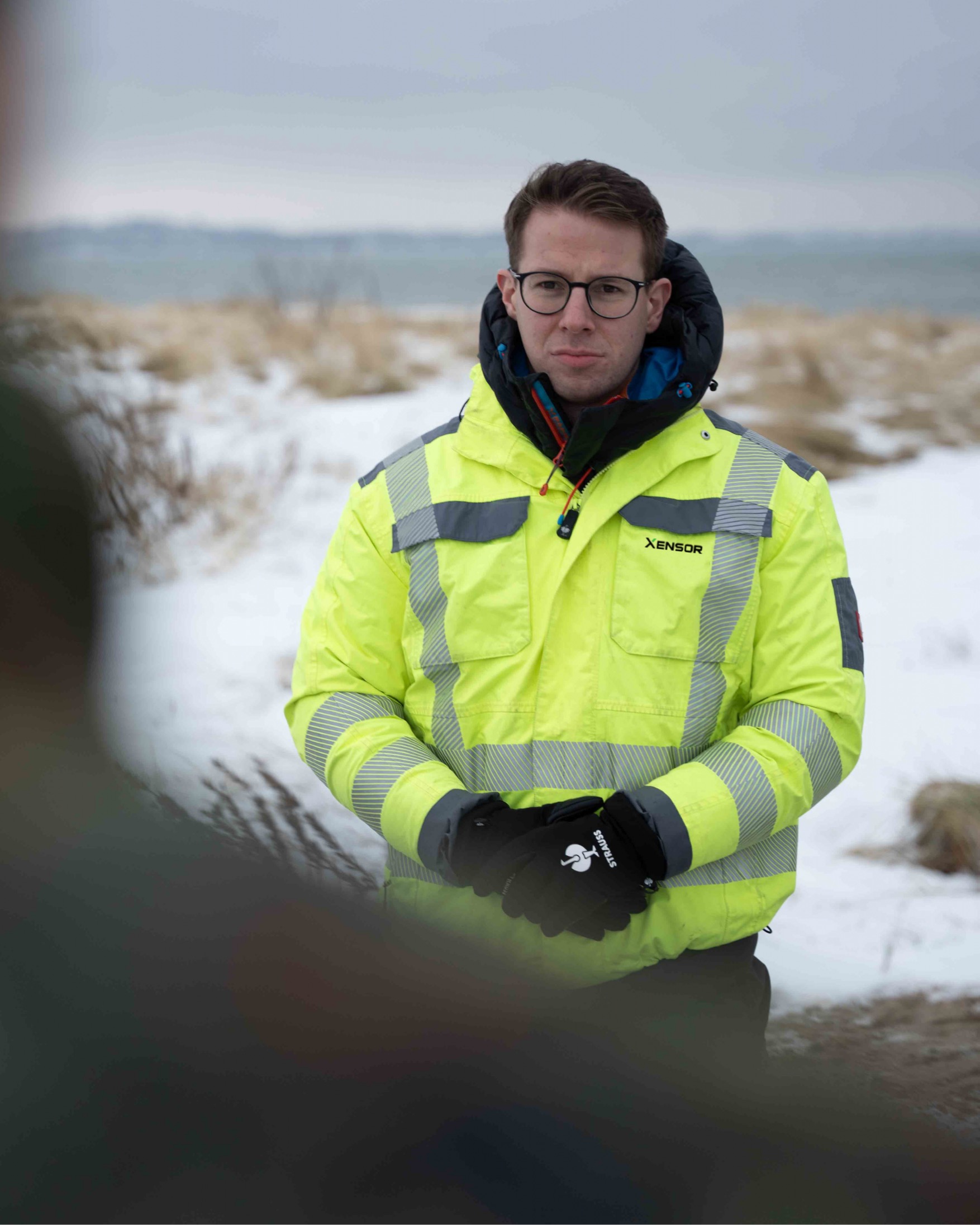 Julian, Xensor team member in field gear during winter operations